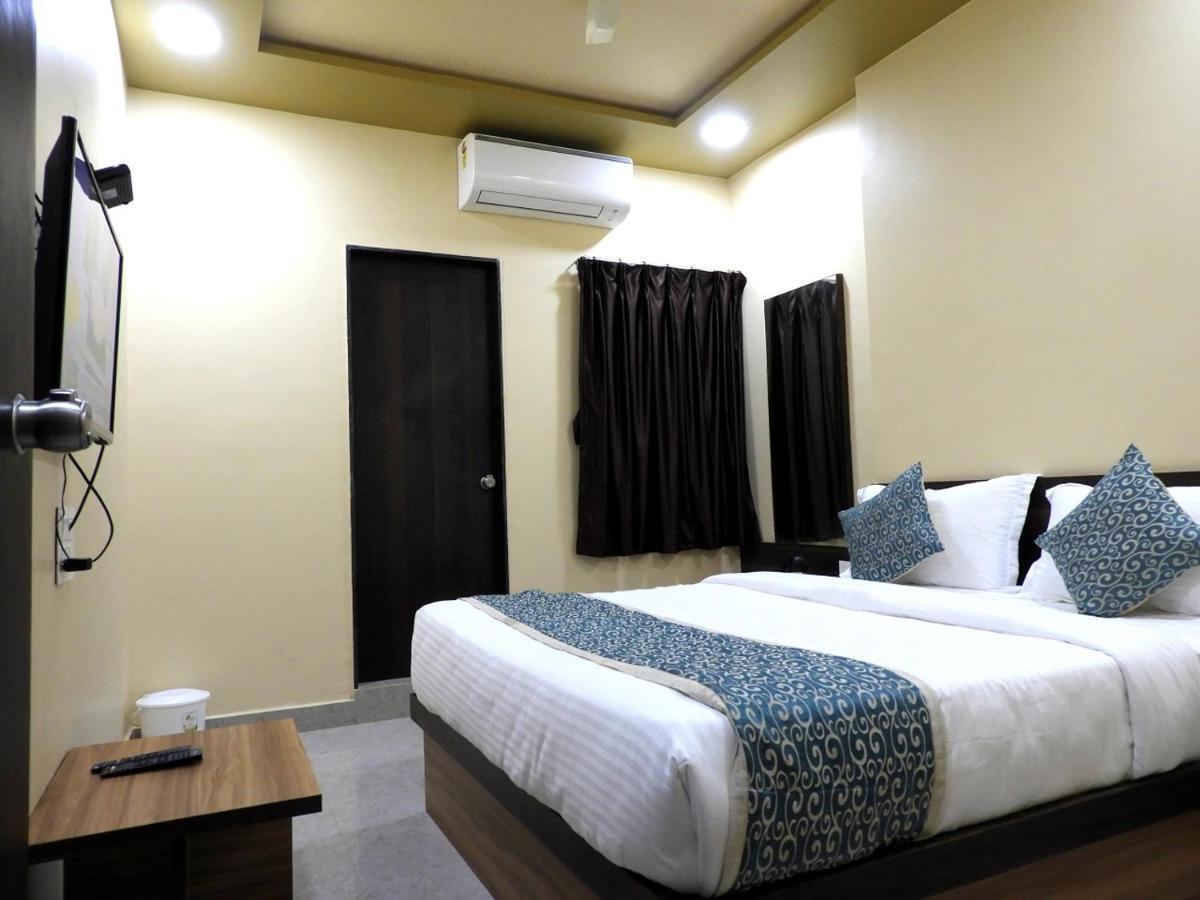 Hotel Somnath Daksh Bagian luar foto
